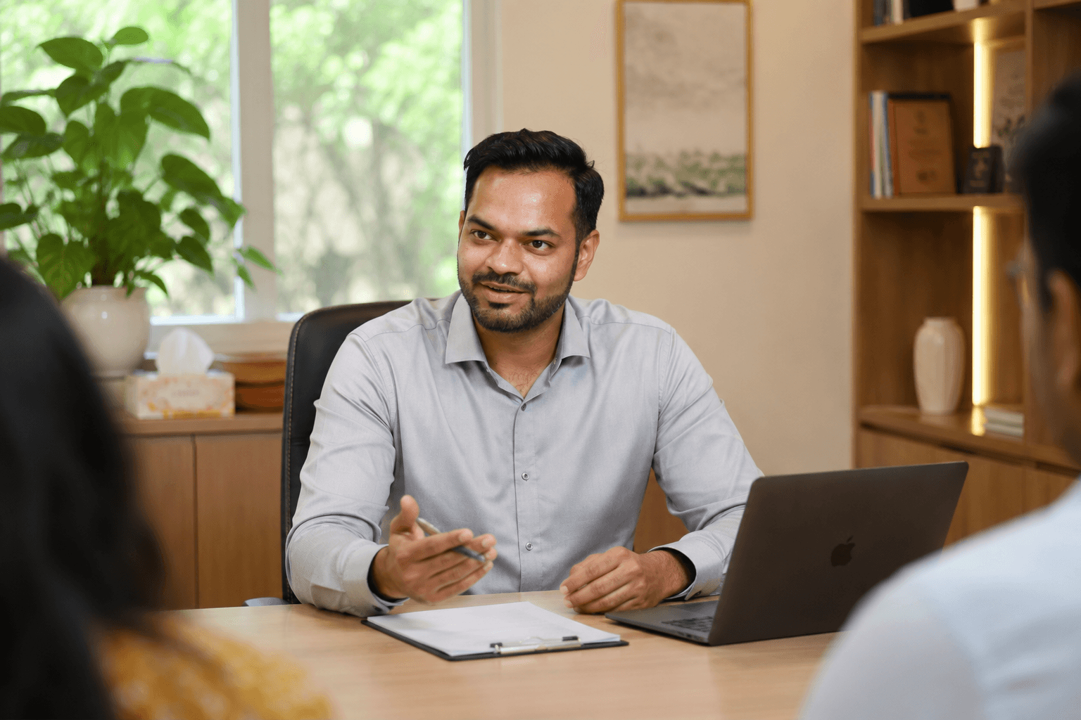 Dr. Reddy in consultation with a patient